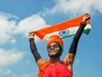 A youngster holds the tricolor during 'Azadi ka Amrit Mahotsav' celebrations for the upcoming Independence Day. A youngster holds the tricolor during 'Azadi ka Amrit Mahotsav' celebrations for the upcoming Independence Day. 