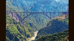 World's highest single-arch railway bridge over the Chenab river, in Reasi district, on Saturday. (PTI) World's highest single-arch railway bridge over the Chenab river, in Reasi district, on Saturday. (PTI)