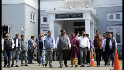 Leader of Opposition Mukesh Agnihotri along with Congress legislators stage a walkout from the assembly over Old Pension Scheme during the Himachal Pradesh Vidhan Sabha monsoon session in Shimla on Saturday. (Deepak Sansta/HT )