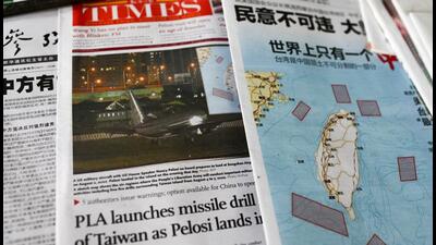 A newspaper announcing that the Chinese People's Liberation Army (PLA) will conduct military exercises and training activities including live-fire drills in response to US House of Representatives Speaker Nancy Pelosi's visit to Taiwan, at a newsstand in Beijing, China. (REUTERS/ FILE) A newspaper announcing that the Chinese People's Liberation Army (PLA) will conduct military exercises and training activities including live-fire drills in response to US House of Representatives Speaker Nancy Pelosi's visit to Taiwan, at a newsstand in Beijing, China. (REUTERS/ FILE)