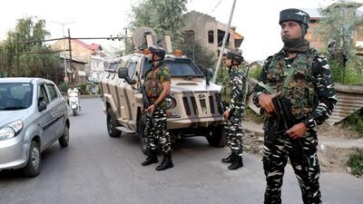 Security personnel stand guard at a site where militants hurled a grenade towards CRPF bunker near Ali Masjid Eidgah area, in Srinagar on Saturday. (ANI)