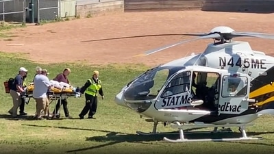 Author Salman Rushdie is taken on a stretcher to a helicopter for transport to a hospital after he was attacked during a lecture in New York. (AP) Author Salman Rushdie is taken on a stretcher to a helicopter for transport to a hospital after he was attacked during a lecture in New York. (AP)