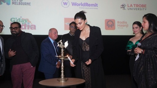 Taapsee Pannu lights a lamp at IFFM. Taapsee Pannu lights a lamp at IFFM.