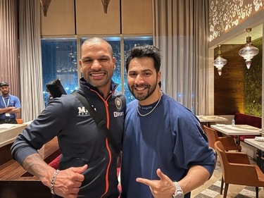 Shikhar Dhawan and Varun Dhawan pose for the camera. Shikhar Dhawan and Varun Dhawan pose for the camera. 