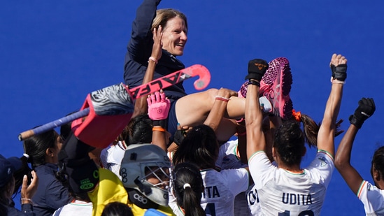 India coach Janneke Schopman is lifted into the air by her team&nbsp;(AP)