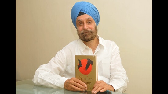 Diplomat-turned-author Navtej Sarna with his latest book, Crimson Spring, at the UT Guest House in Chandigarh on Saturday. (Photo: Ravi Kumar/HT)