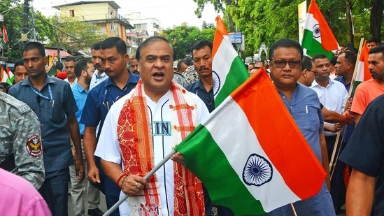 Assam chief minister Himanta Biswa Sarma holding a national flag participates in a morning march (Prabhat Pheri) as part of the Har Ghar Tiranga campaign under the Azadi Ka Amrit Mahotsav, in Guwahati on Saturday. (ANI Photo)