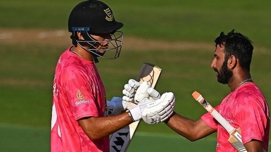 Cheteshwar Pujara (R) (Twitter/Sussex)