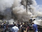Smoke rises from Surmalu market about two kilometers (1.2 miles) south of the center Yerevan, Armenia.