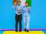 Indian weightlifter Bindyarani Devi Sorokhaibam with her idol Mirabai Chanu at the Commonwealth Games in Birmingham. (Instagram/_bindyarani)