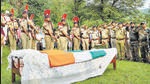 Poonch: Police personnel pay their last respects to policeman Tahir Khan, who was killed in a grenade attack by terrorists in J&K's Kulgam district, at Mendhar in Poonch district, Sunday, Aug. 14, 2022. (PTI Photo)(PTI08_14_2022_000239A) (PTI) Poonch: Police personnel pay their last respects to policeman Tahir Khan, who was killed in a grenade attack by terrorists in J&K's Kulgam district, at Mendhar in Poonch district, Sunday, Aug. 14, 2022. (PTI Photo)(PTI08_14_2022_000239A) (PTI)