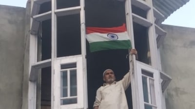 Father of slain terrorist Rayaz Naikoo hoisted the Indian national flag at his residence at Beighpora village of South Kashmir's Pulwama district. Father of slain terrorist Rayaz Naikoo hoisted the Indian national flag at his residence at Beighpora village of South Kashmir's Pulwama district.