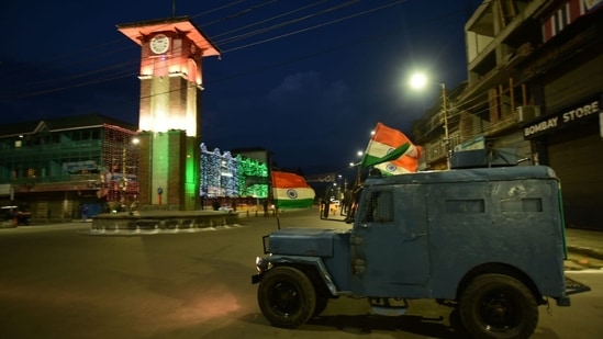 The Clock Tower (Ghanta Ghar) at Lal Chowk of Srinagar has been illuminated in Tricolour on Sunday, ahead of Independence Day .(Photo By Waseem Andrabi Hindustan Times)