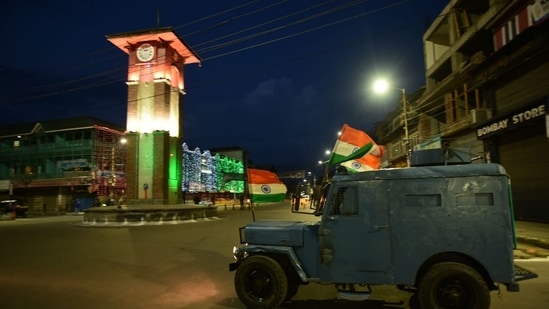 The Clock Tower at Lal Chowk of Srinagar has been illuminated in Tricolour on Sunday, ahead of Independence Day.&nbsp;(Waseem Andrabi/HT photo)