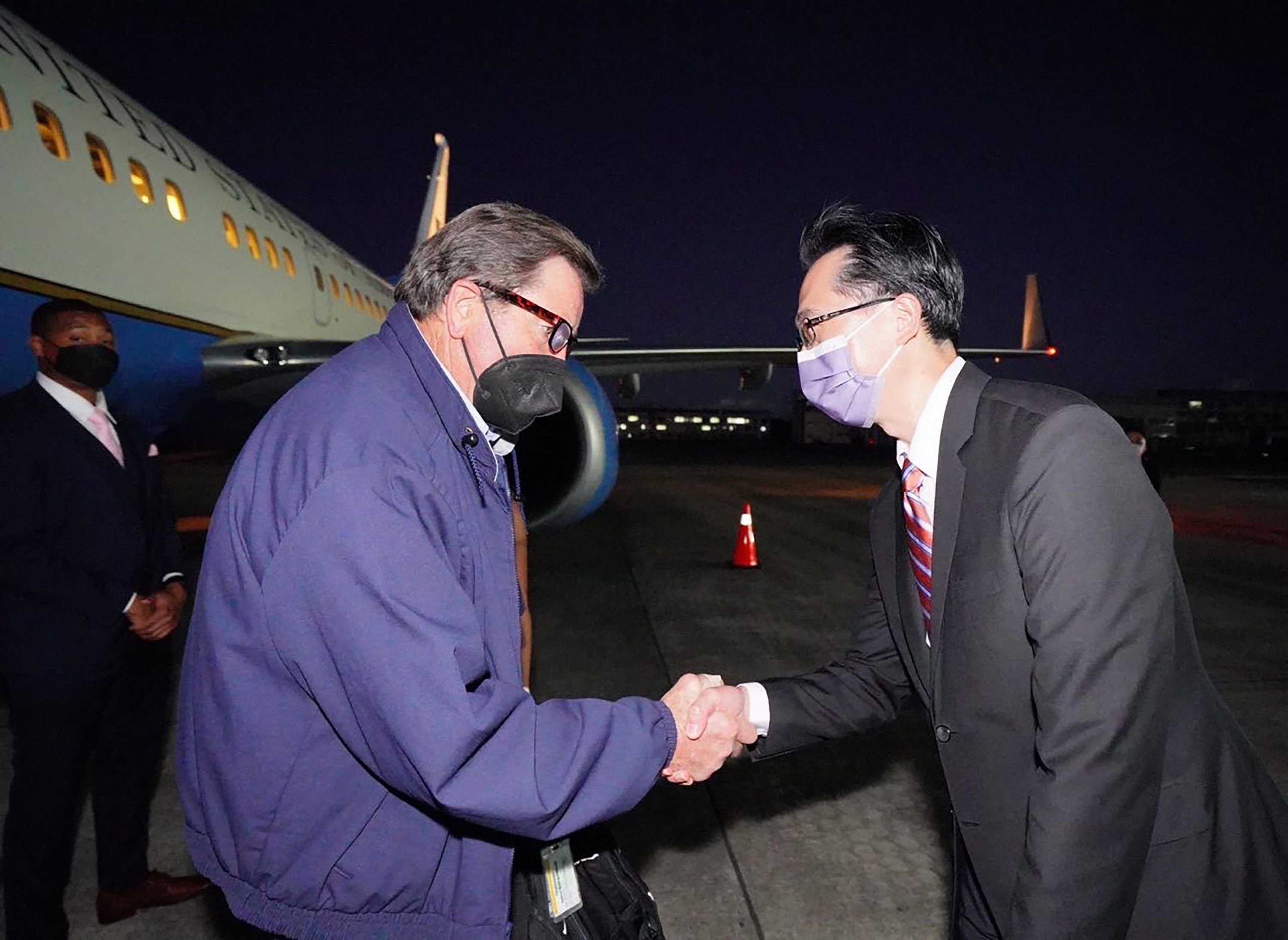 US Representative John Garamendi (L) shaking hands with Taiwanese diplomat Douglas Yu-tien Hsu upon his arrival at Sungshan Airport in Taipei. (Photo by Handout/MINISTRY OF FOREIGN AFFAIRS/AFP) US Representative John Garamendi (L) shaking hands with Taiwanese diplomat Douglas Yu-tien Hsu upon his arrival at Sungshan Airport in Taipei. (Photo by Handout/MINISTRY OF FOREIGN AFFAIRS/AFP)