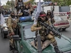 Taliban fighters celebrate one year since they seized the Afghan capital, Kabul, on Monday. (AP) Taliban fighters celebrate one year since they seized the Afghan capital, Kabul, on Monday. (AP)