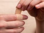 Bandages application becomes tough on wet skin surface as it looses its stickiness. &nbsp;(Photo by Diana Polekhina on Unsplash)