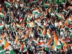 People hold tricolour flags at the 'Har Hath Tiranga' program on the eve of Independence Day 2022, in New Delhi.(ANI) People hold tricolour flags at the 'Har Hath Tiranga' program on the eve of Independence Day 2022, in New Delhi.(ANI)