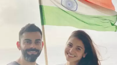 Anushka Sharma and Virat Kohli were all smiles as they posed along with the national flag in the backdrop. Anushka shared the picture and captioned it, "#HappyIndependenceDay." (Instagram/@anushkasharma) Anushka Sharma and Virat Kohli were all smiles as they posed along with the national flag in the backdrop. Anushka shared the picture and captioned it, "#HappyIndependenceDay." (Instagram/@anushkasharma)