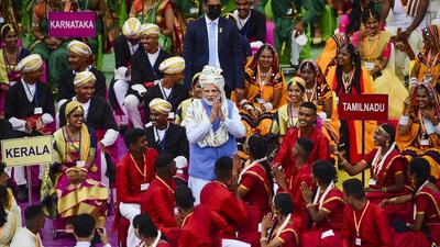 **EDS: RPT, CORRECTS SCHOOLCHILDREN TO NCC CADETS** New Delhi: Prime Minister Narendra Modi waves at NCC cadets as he leaves after addressing the nation from the ramparts of the Red Fort on the occasion of the 76th Independence Day, in New Delhi, Monday, Aug 15, 2022. (PTI Photo/Kamal Kishore) (PTI08_15_2022_000044B) (PTI) **EDS: RPT, CORRECTS SCHOOLCHILDREN TO NCC CADETS** New Delhi: Prime Minister Narendra Modi waves at NCC cadets as he leaves after addressing the nation from the ramparts of the Red Fort on the occasion of the 76th Independence Day, in New Delhi, Monday, Aug 15, 2022. (PTI Photo/Kamal Kishore) (PTI08_15_2022_000044B) (PTI)