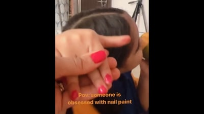 The little girl shows off her nails that she painted all by herself.&nbsp; (Instagram/@cute_kukasingh)