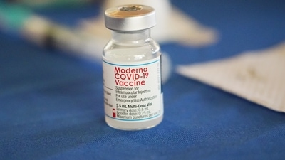 A vial of the Moderna vaccine rests on a table at an inoculation station next to Jackson State University in Jackson, Miss. (AP file) A vial of the Moderna vaccine rests on a table at an inoculation station next to Jackson State University in Jackson, Miss. (AP file)
