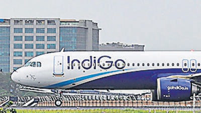 An aircraft operated by IndiGo, a unit of InterGlobe Aviation Ltd., lands at Chhatrapati Shivaji International Airport in Mumbai, India, on Monday, July 25, 2022. InterGlobe Aviation Ltd., is scheduled to release earnings figures on July 27, 2022. Photographer: Dhiraj Singh/Bloomberg (Bloomberg)