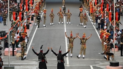 Huge crowd, wrapped in patriotic fervour gathered to watch the ceremony in Amritsar city of Punjab (AFP) Huge crowd, wrapped in patriotic fervour gathered to watch the ceremony in Amritsar city of Punjab (AFP)