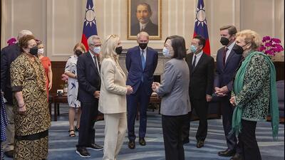 Taiwan's President Tsai Ing-wen (fourth from right) chat with the members of a delegation of US Congress during a meeting at the Presidential Office in Taipei, on Monday. (AP) Taiwan's President Tsai Ing-wen (fourth from right) chat with the members of a delegation of US Congress during a meeting at the Presidential Office in Taipei, on Monday. (AP)