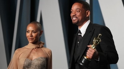 Will Smith and Jada Pinkett Smith arrive at the Vanity Fair Oscar party during the 94th Academy Awards.