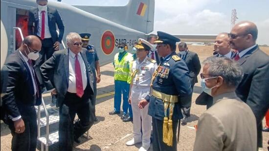 Indian envoy in Sri Lanka Gopal Baglay with Sri Lanka President Ranil Wickremesinghe and Navy personnel during a ceremony for the handover of a Dornier 228 Maritime Patrol Aircraft to Sri Lanka to enhance their maritime surveillance capabilities and bolster the bilateral defence ties, in Colombo (Twitter/IndiainSL)