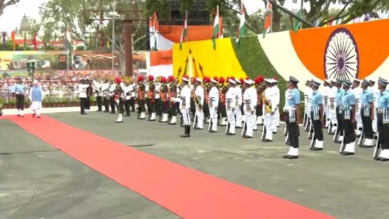 On the occasion, PM Modi wore a white safa with tricolour stripes and a long trail for his 76th Independence Day look.(ANI)
