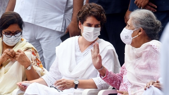 Congress leaders Priyanka Gandhi and Ambika Soni indulge in a conversation during the flag hoisting ceremony.(ANI)