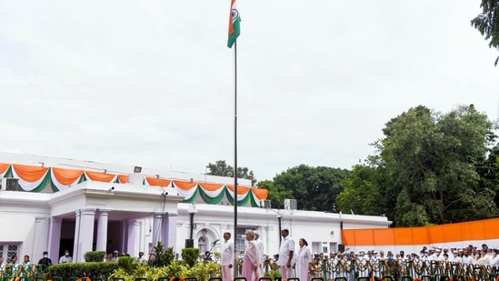 Congress leader Ambika Soni and others stand for the National anthem after hoisting the flag on the occasion of 76th Independence Day.(ANI)