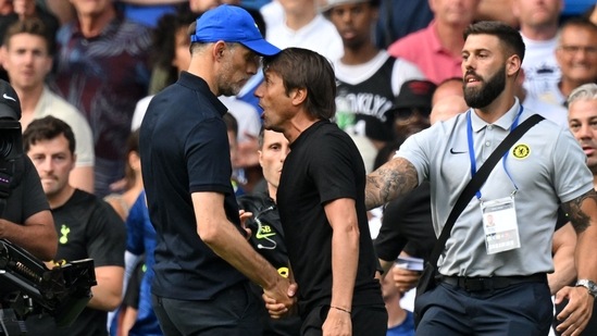 Thomas Tuchel and Antonio Conte shake hands then clash after the English Premier League football match between Chelsea and Tottenham Hotspur at Stamford Bridge in London.(AFP)