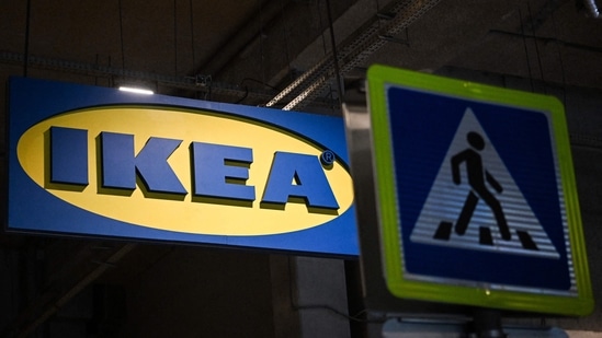 The logo of Swedish retailer Ikea (L). (Photo by Kirill KUDRYAVTSEV/AFP)