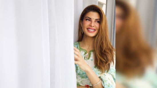 Jacqueline Fernandez's outfit features lace detailing around the chest and borders. The set comes with a printed dupatta(Instagram/@jacquelinef143)