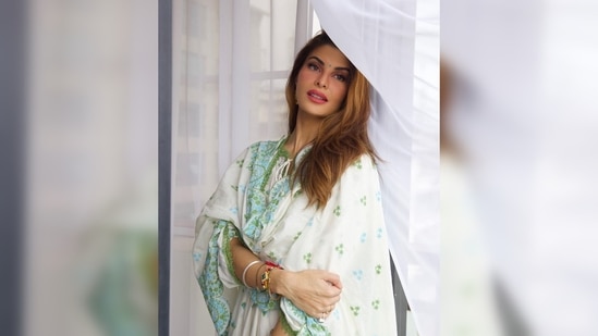 Jacqueline Fernandez completed her traditional look with a matching bindi, bangles and small hoop earrings.(Instagram/@jacquelinef143)