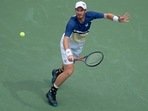 Andy Murray (GBR) returns a shot during his match against Stanislas Wawrinka (SUI) at the Western &amp; Southern.