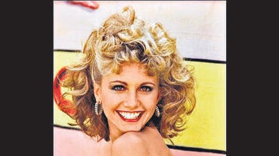 Olivia Newton-John cemented her name in the world of fashion with her iconic outfits and hairstyles (Photos: Twitter) Olivia Newton-John cemented her name in the world of fashion with her iconic outfits and hairstyles (Photos: Twitter)