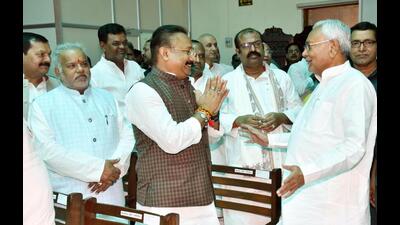 Bihar CM Nitish Kumar interacts with new cabinet ministers in Patna on Tuesday. (Santosh Kumar/HT Photo) Bihar CM Nitish Kumar interacts with new cabinet ministers in Patna on Tuesday. (Santosh Kumar/HT Photo)