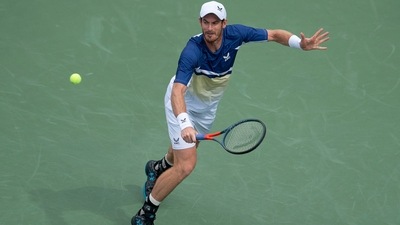 Andy Murray (GBR) returns a shot during his match against Stanislas Wawrinka (SUI) at the Western &amp; Southern. (USA TODAY Sports)