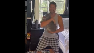 The cat ‘expects’ its human to wake up like this.&nbsp; (Instagram/@nathanthecatlady)