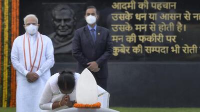 President Droupadi Murmu and PM Modi pay tributes to former prime minister Atal Bihari Vajpayee on his death anniversary at his memorial Sadaiv Atal in New Delhi on Tuesday. (PTI Photo) President Droupadi Murmu and PM Modi pay tributes to former prime minister Atal Bihari Vajpayee on his death anniversary at his memorial Sadaiv Atal in New Delhi on Tuesday. (PTI Photo)