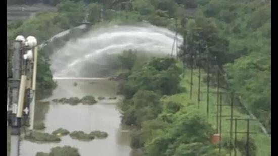 Water gushing out following a pipeline burst in Kamothe on Tuesday morning, affecting the water supply to residents. (HT PHOTO)