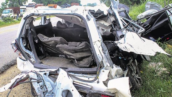 The wreckage of the car. The driver of the truck is at large, and police said it is still unclear if the suspect fell asleep at the wheel, if the commercial vehicle was speeding, or whether brakes failed. (PTI) The wreckage of the car. The driver of the truck is at large, and police said it is still unclear if the suspect fell asleep at the wheel, if the commercial vehicle was speeding, or whether brakes failed. (PTI)