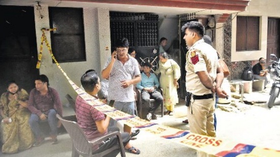 Delhi Police outside the victims’ house in northwest Delhi’s Subhash Park. (HT Photo)