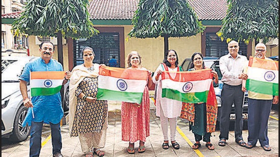 Residents of Evershine housing society in Thakur village gearing up for the 76th Independence Day celebrations HT Photo