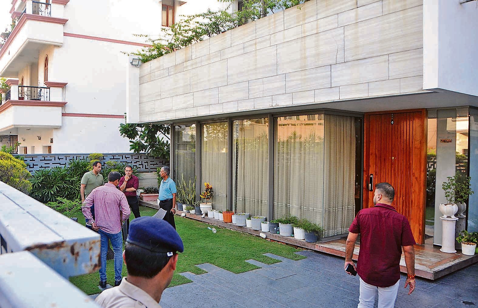 Police investigating the crime scene in Sector 35 in Chandigarh on Tuesday evening. (Keshav Singh/HT)