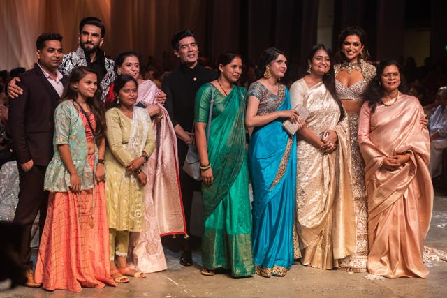 Actors Deepika Padukone and Ranveer Singh with designer Manish Malhotra and the Mijwan team at the Mijwan Fashion show in Mumbai, (Pratik Chorge/HT Photo) Actors Deepika Padukone and Ranveer Singh with designer Manish Malhotra and the Mijwan team at the Mijwan Fashion show in Mumbai, (Pratik Chorge/HT Photo)